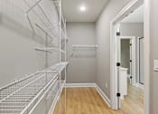 Thumbnail 48 of 53 - the walk in closet in a new home with a mirrored closet door