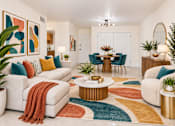 Thumbnail 7 of 22 - A living room with a white sofa, a coffee table, and a rug with a multicolored pattern.