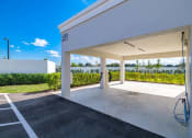 Thumbnail 48 of 78 - the garage of a house with a view of the water at Altis Blue Lake, Lake Worth, Florida