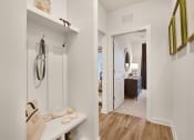 Thumbnail 34 of 49 - a walk in closet and bathroom in a 555 waverly unit