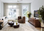 Thumbnail 18 of 28 - a living room filled with furniture and a large window