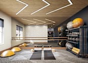 Thumbnail 16 of 28 - a gym with a variety of weights and yoga mats