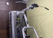 Thumbnail 13 of 25 - a gym with a exercise machine in the corner of a room