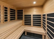Thumbnail 26 of 94 - a sauna with a bench and a wall of closets
