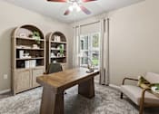 Thumbnail 8 of 38 - A dining room with a wooden table and chairs.