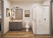 Thumbnail 14 of 16 - A bathroom with a toilet, sink, and shower.