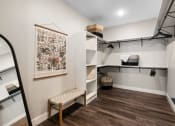 Thumbnail 87 of 94 - a room with a white and pink wall and a bench