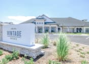 Thumbnail 58 of 60 - the exterior of a building with a sign that says vinage boardwalk