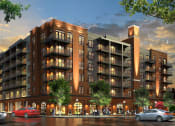 Thumbnail 28 of 28 - a rendering of a large apartment building on a city street