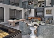 Thumbnail 2 of 49 - A modern living room with a pool table and a spiral staircase.
