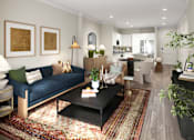 Thumbnail 18 of 49 - A living room with a blue couch and a coffee table.