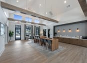 Thumbnail 2 of 28 - a large kitchen and dining room with a large table and chairs