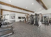 Thumbnail 41 of 71 - the gym is equipped with weights and cardio equipment