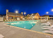 Thumbnail 52 of 71 - the resort style pool is lit up at night