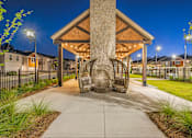 Thumbnail 62 of 71 - the preserve at ballantyne commons clubhouse with fire pit at night
