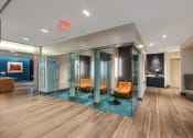 Thumbnail 32 of 47 - Three-Bedroom Luxury Apartments In Atlanta, GA - Venue Brookwood - Phone Booth Offices With Glass Walls And Coffee Bar.