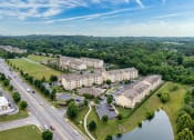 Thumbnail 28 of 29 - an aerial view of an apartment complex next to a river