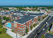 Thumbnail 44 of 46 - an aerial view of a building with a swimming pool