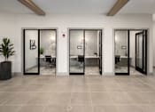 Thumbnail 25 of 45 - Three glass doors in a row with a plant on the left.