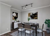 Thumbnail 9 of 32 - A dining room with a table set for four.
