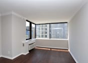 Thumbnail 19 of 32 - A room with a window seat and a radiator.