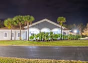 Thumbnail 33 of 43 - A building with a dark sky in the background.