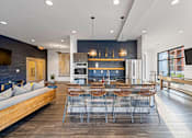 Thumbnail 13 of 31 - a kitchen and dining room with a table and chairs