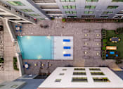 Thumbnail 28 of 31 - a rendering of the lobby of a building with an indoor pool