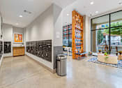 Thumbnail 12 of 31 - the entrance to the building has a large wall of wine racks