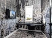 Thumbnail 6 of 71 - a home office with a desk and a window