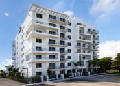 Thumbnail 28 of 30 - a large white apartment building on a sunny day at Saba Pompano Beach, Pompano Beach, 33062
