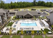 Thumbnail 58 of 70 - an aerial view of the pool at the resort on a sunny day