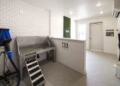 Thumbnail 36 of 70 - a large stainless steel sink in a room with a dryer