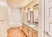 Thumbnail 10 of 34 - Bathroom with Designer Granite Countertops at The Parker at Maitland Station in Maitland, FL