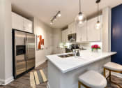 Thumbnail 4 of 58 - kitchen in a bedroom plus den unit.
