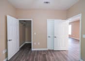 Thumbnail 42 of 69 - an empty room with two doors and a closet