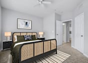 Thumbnail 9 of 29 - A bedroom with a bed, nightstands, and a painting on the wall.
