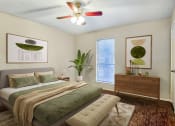 Thumbnail 3 of 13 - a bedroom with a large bed and a ceiling fan