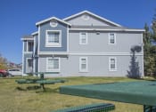 Thumbnail 9 of 43 - a large white building with a fountain in front of it
