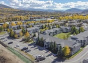Thumbnail 2 of 43 - an aerial view of a neighborhood of houses with cars parked in front of them