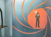 Thumbnail 16 of 27 - a painting of a man in a suit holding a lightbulb in front of his face