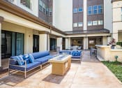 Thumbnail 30 of 35 - the preserve at ballantyne commons commons lobby with couches and a fire pit