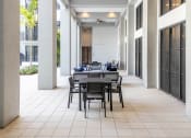Thumbnail 19 of 22 - a patio with a large table and chairs at Leena Plantation, Plantation, FL