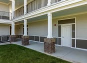 Thumbnail 19 of 23 - a view of the entrance to a building at the whispering winds apartments in pearland