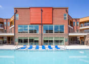 Thumbnail 26 of 32 - our apartments have a large pool in front of our building