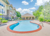 Thumbnail 17 of 29 - the preserve at ballantyne commons pool and spa with apartment buildings