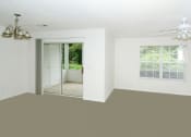 Thumbnail 26 of 36 - living room with glass sliding door porch