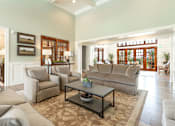 Thumbnail 10 of 33 - Modern Clubhouse with Couches and Table at Greystone Pointe, Knoxville, TN, 37932