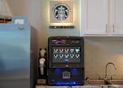 Thumbnail 16 of 29 - a kitchen with a microwave and a refrigerator