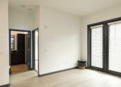 Thumbnail 31 of 47 - a living room with a wall that has a decoration on it